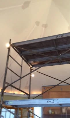 Scaffolding set up for a kitchen ceiling drywall repair